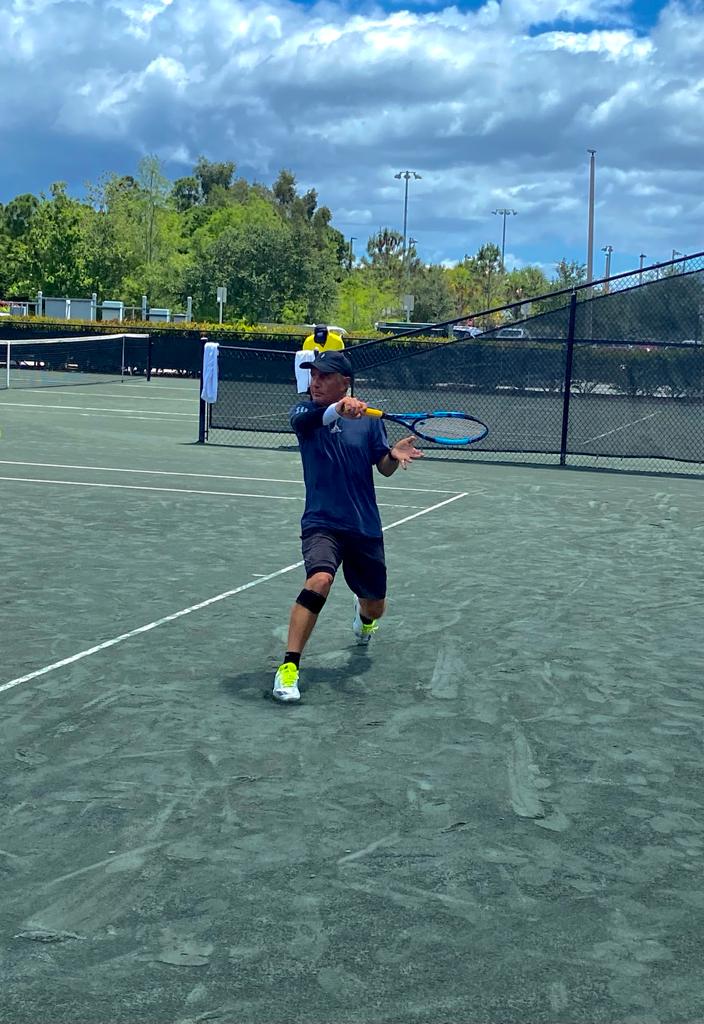 About Us - Alfredo Rivera in clay Court About Us - Alfredo Rivera in clay Court