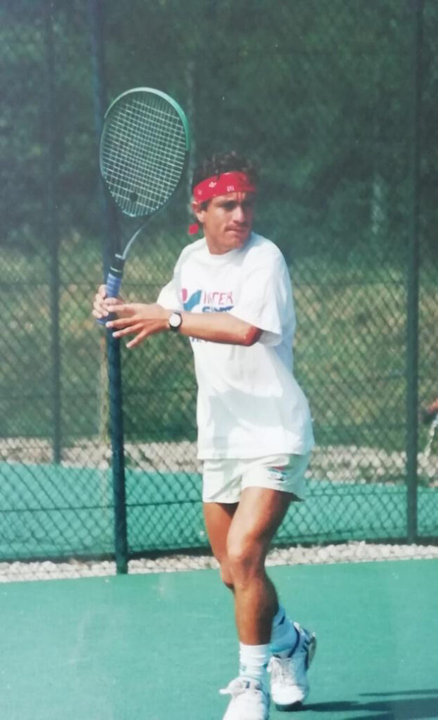 Alfredo Rivera Forehand About Us -Alfredo Rivera preparing to hit a forehand