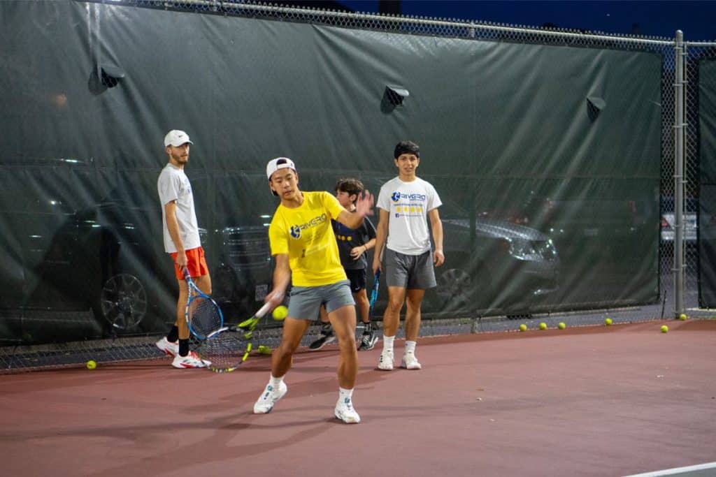 Elite Tennis Lesson - Mihn Elite Tennis Lessons - a Tennis Player Hitting a Forehand