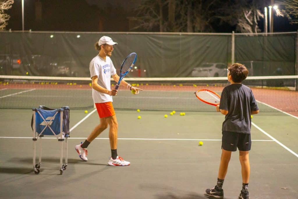 Private Tennis Lessons BG Private Tennis Lessons - Sebastian Trujillo teaching a forehand