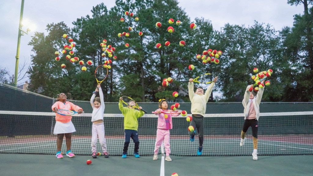 Tennis Camp in Spring, TX a group of kids playing tennis